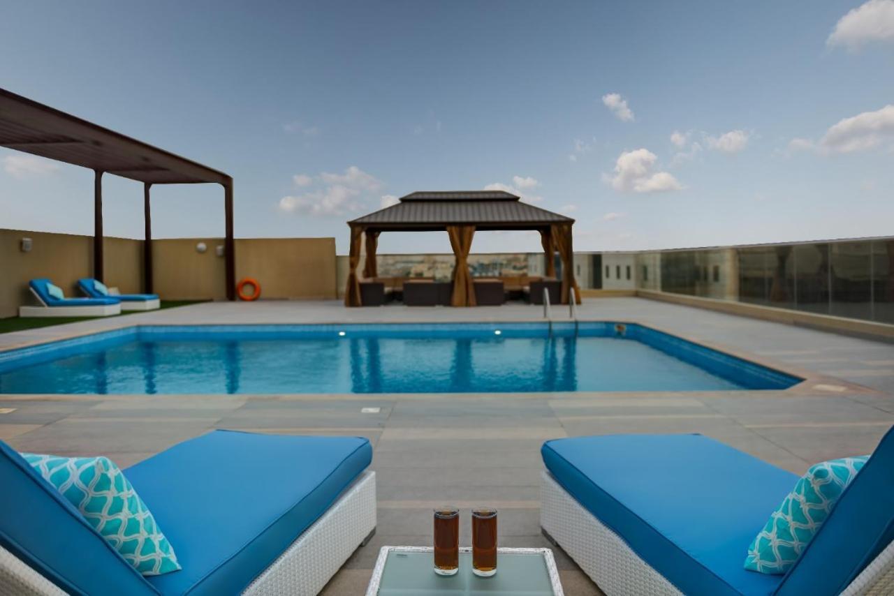 Abar Hotel Apartments Dip-1 دبي المظهر الخارجي الصورة